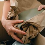 Wrapping household items in packing paper