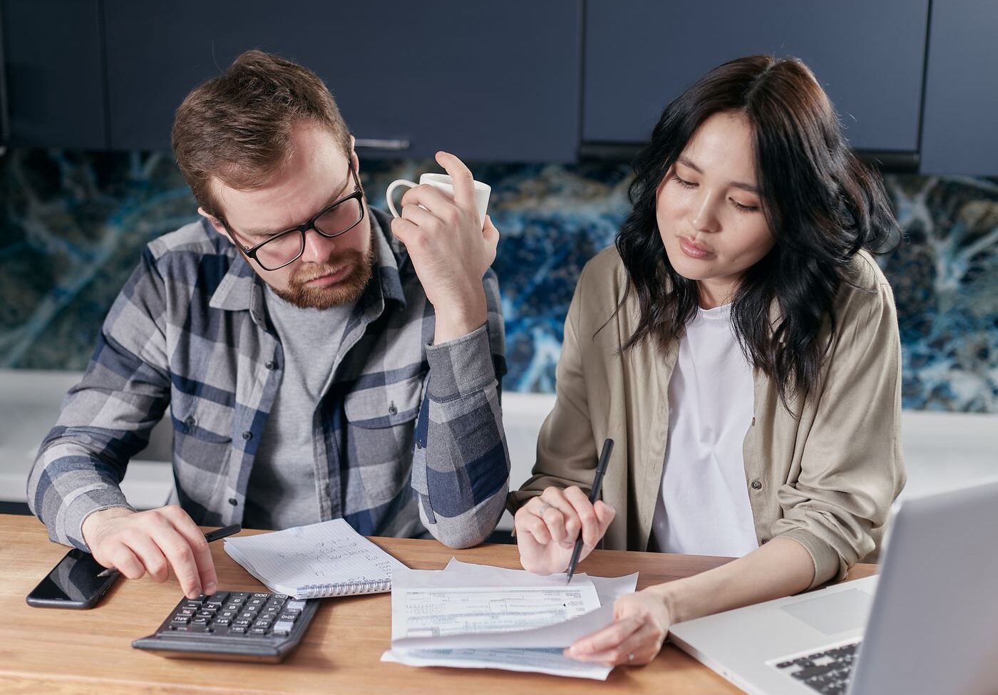 Comparing moving quotes and pricing at the kitchen table